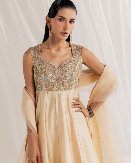 Eraya Serene Aurora champagne lehnga peshwas showing embellished bodice and soft organza dupatta