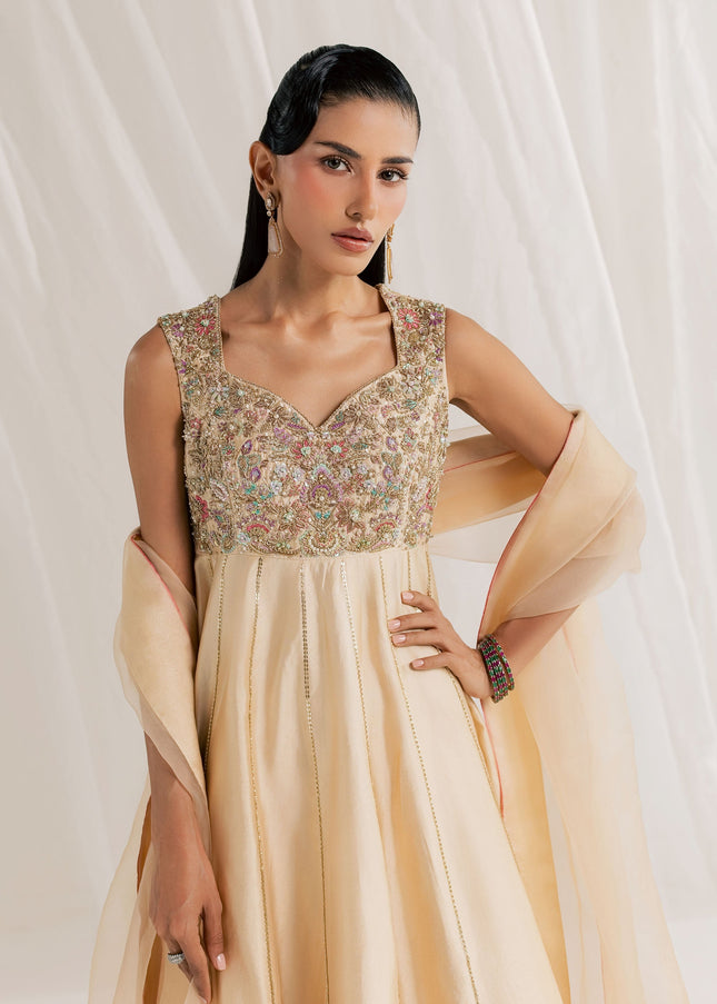 Eraya Serene Aurora champagne lehnga peshwas showing embellished bodice and soft organza dupatta
