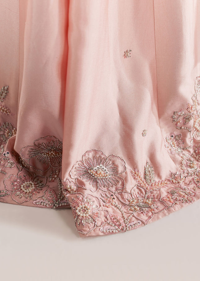Detail of the embellished floral border on the Eraya Serene Blossom blush pink lehnga