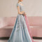 Model wearing Eraya Serene Camellia ice blue embellished lehnga choli with pink Mukesh organza dupatta
