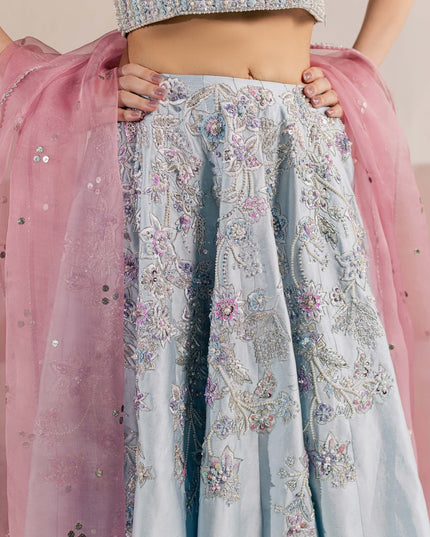 Detail of the hand-embellished floral work on the Eraya Serene Camellia ice blue lehnga