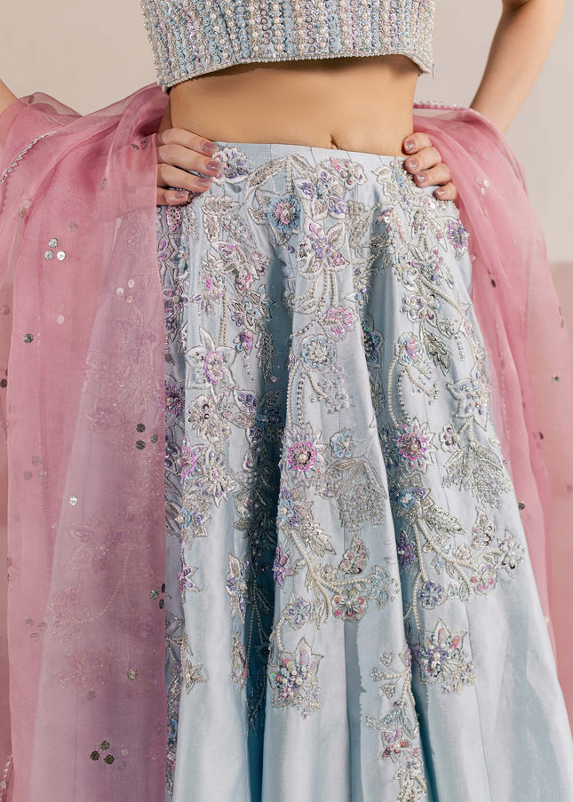 Detail of the hand-embellished floral work on the Eraya Serene Camellia ice blue lehnga