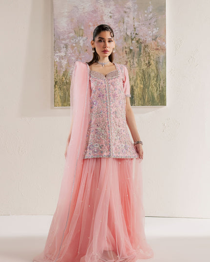 Model wearing Eraya Serene Flora pink embellished shirt with net lehnga and net dupatta
