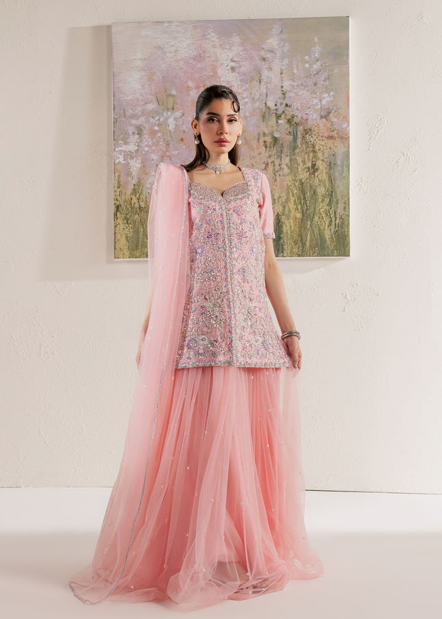 Model wearing Eraya Serene Flora pink embellished shirt with net lehnga and net dupatta
