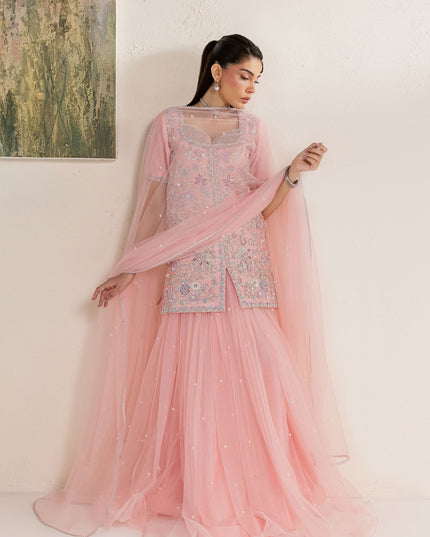 Eraya Serene Flora pink lehnga outfit with net dupatta held out to show the pearl spray detail