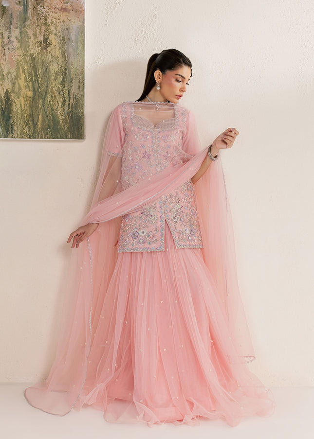 Eraya Serene Flora pink lehnga outfit with net dupatta held out to show the pearl spray detail