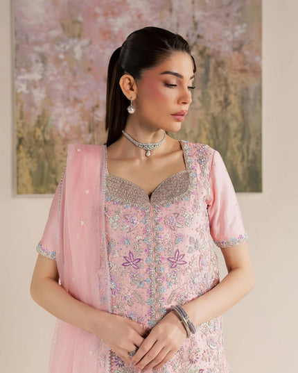 Close view of Eraya Serene Flora pink shirt showing sweetheart neckline and floral embellishment