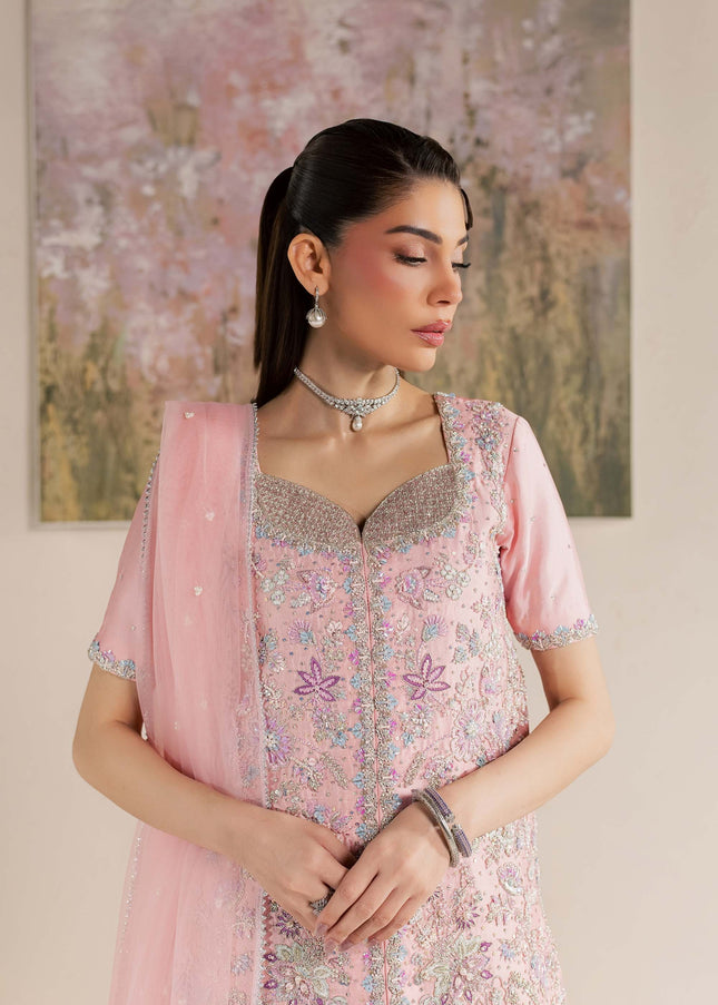 Close view of Eraya Serene Flora pink shirt showing sweetheart neckline and floral embellishment
