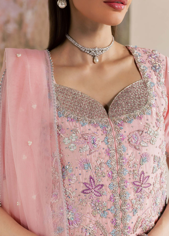 Macro detail of the embellished neckline on the Eraya Serene Flora pink shirt