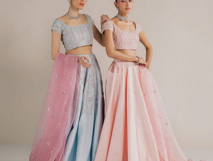 Eraya Seréne ice blue and blush pink lehnga choli sets with sheer ombre organza dupattas trailing