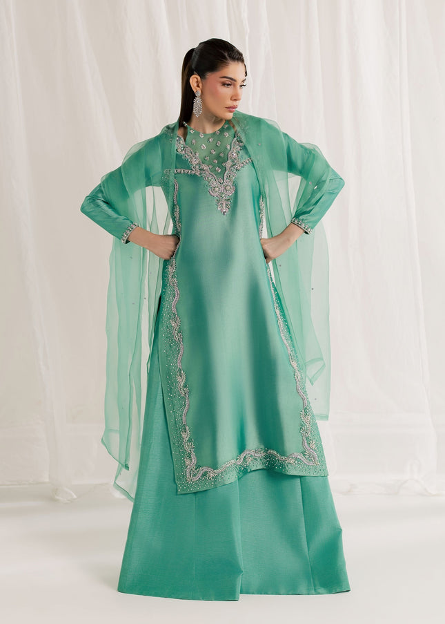 Model wearing Eraya Serene Meadow mint green embellished shirt with flared pants and organza dupatta