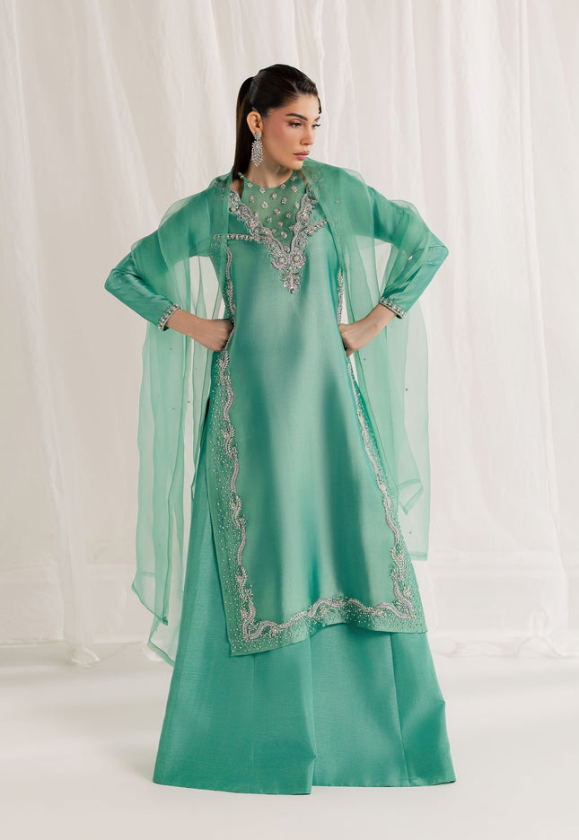 Model wearing Eraya Serene Meadow mint green embellished shirt with flared pants and organza dupatta