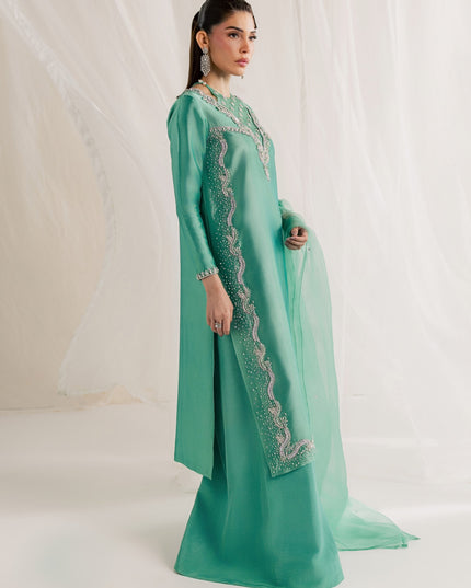Eraya Serene Meadow mint green three-piece outfit shown from the side with sheer organza dupatta