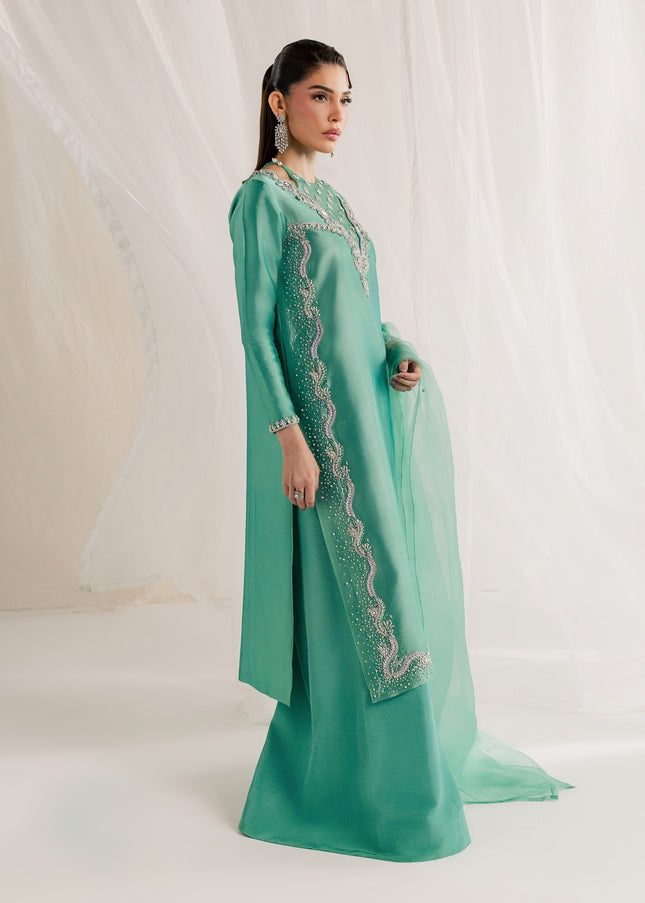 Eraya Serene Meadow mint green three-piece outfit shown from the side with sheer organza dupatta