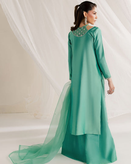 Back view of Eraya Serene Meadow mint green shirt with flowing organza dupatta and flared pants