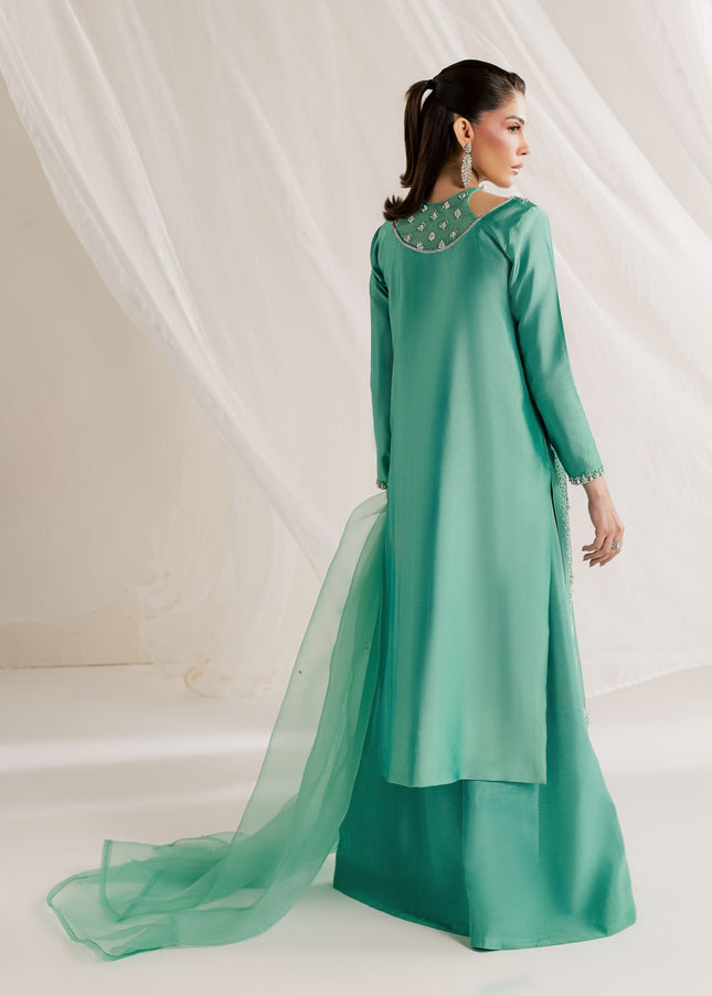 Back view of Eraya Serene Meadow mint green shirt with flowing organza dupatta and flared pants