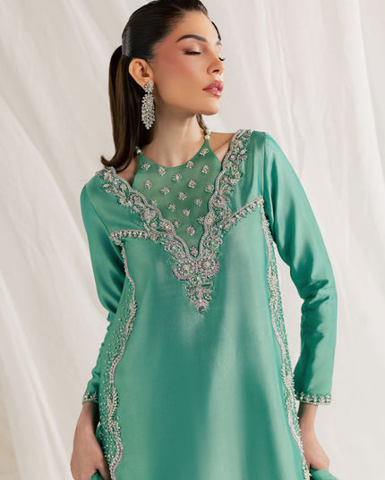 Eraya Serene Meadow mint green shirt showing embellished V neckline and scalloped hem detail