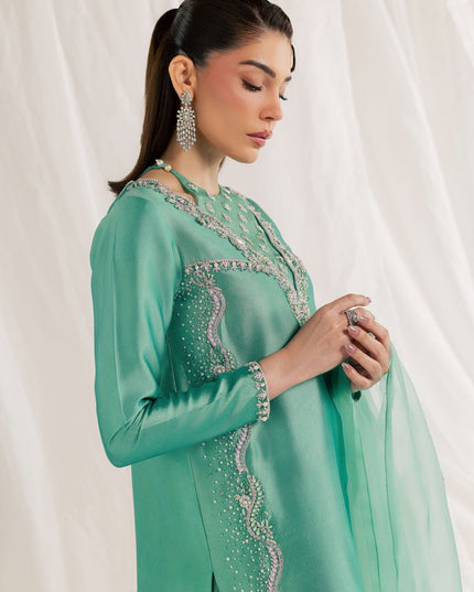 Eraya Serene Meadow mint green shirt detail showing hand-embellished sleeve and side panel work