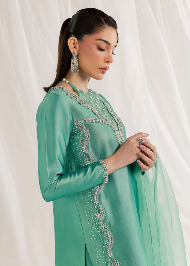 Eraya Serene Meadow mint green shirt detail showing hand-embellished sleeve and side panel work