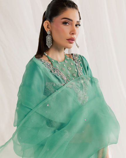 Sheer mint green organza dupatta from the Eraya Serene Meadow outfit draped across the shoulder