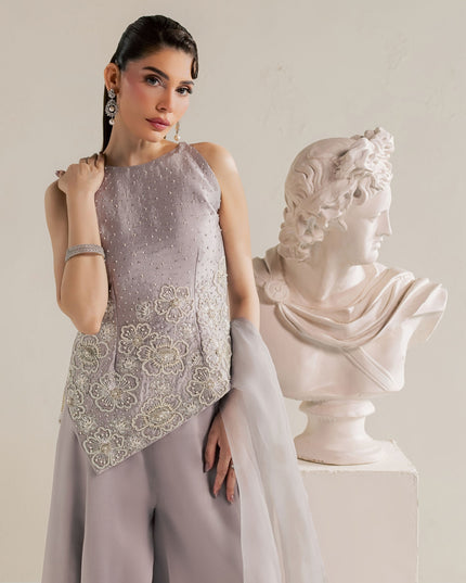 Eraya Serene Moonstone grey lilac top showing embellished floral motifs and halter neckline