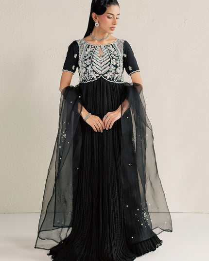 Model wearing Eraya Serene Raven black peshwas with embellished yoke and sheer organza dupatta