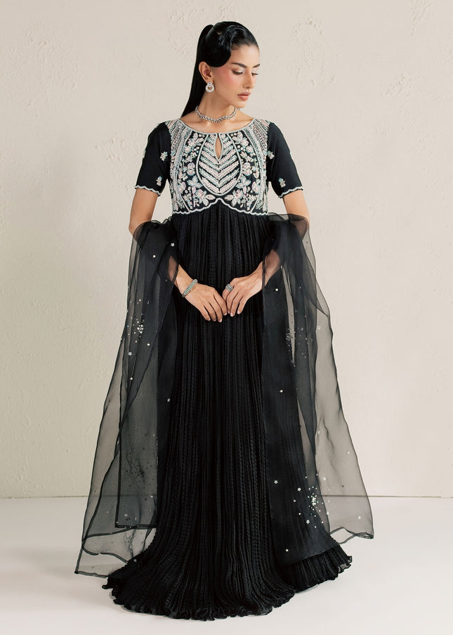 Model wearing Eraya Serene Raven black peshwas with embellished yoke and sheer organza dupatta