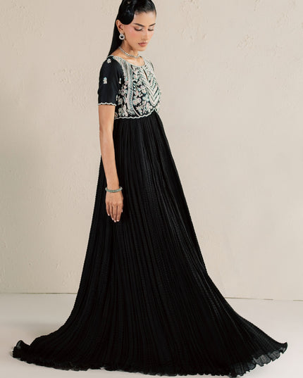 Side view of Eraya Serene Raven black peshwas showing the full crushed silk flare
