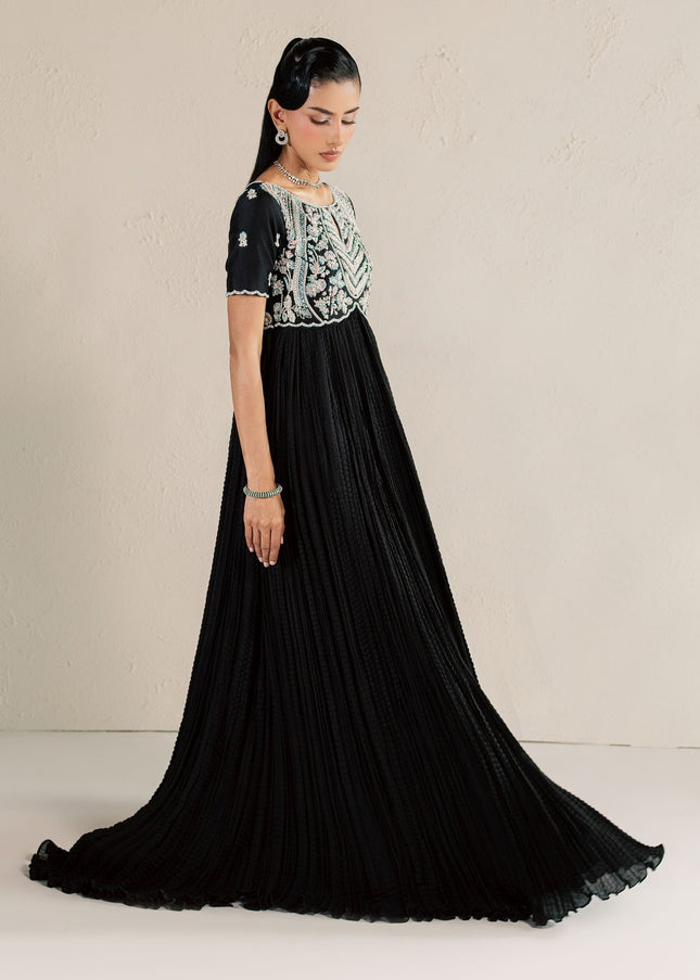 Side view of Eraya Serene Raven black peshwas showing the full crushed silk flare