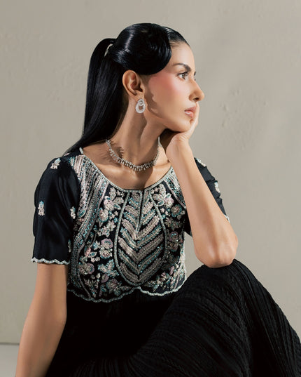 Seated close view of the Eraya Serene Raven black peshwas embellished bodice