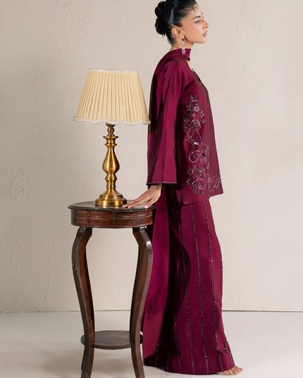 Side view of Eraya Serene Ruby wine outfit showing the sequin lines on the silk pants
